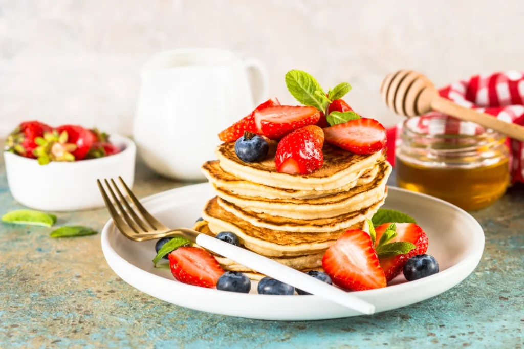 pancakes-with-fresh-berries-and-honey